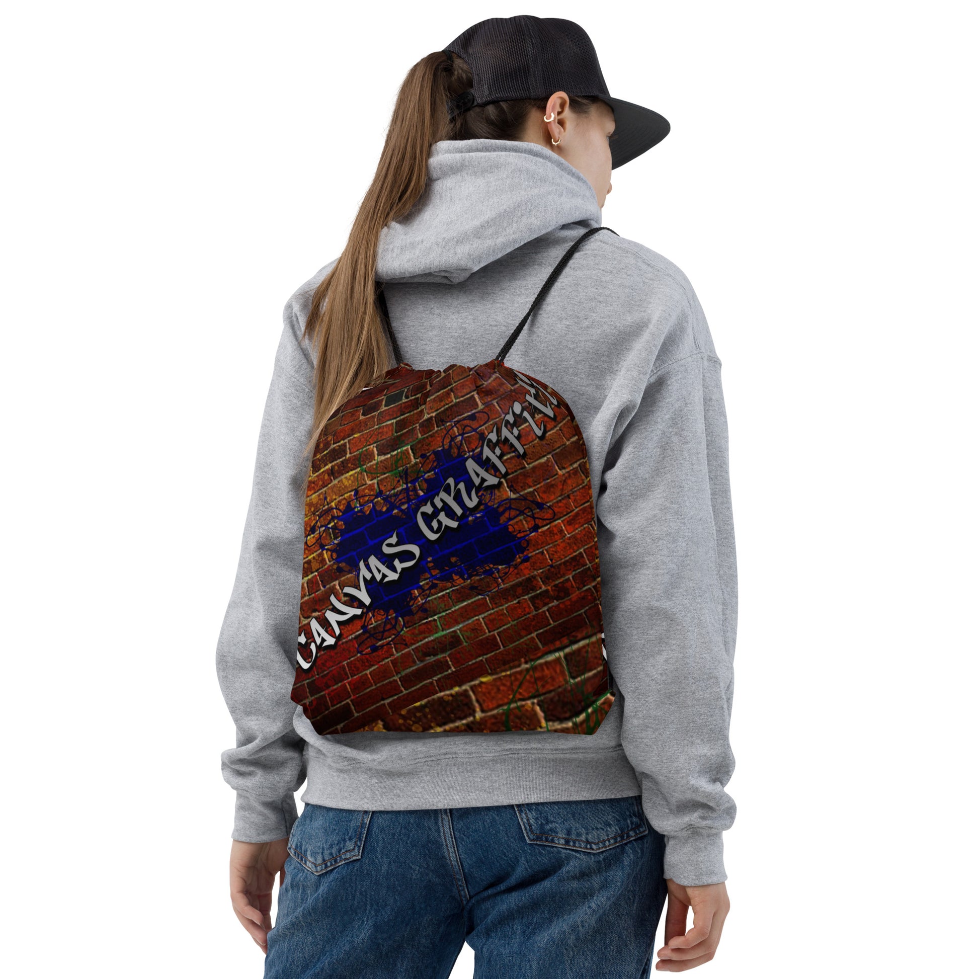 Drawstring bag (brick)Combine your love for vibrant prints and a sporty style with a cool drawstring bag. It's a must-have gym essential that can be worn as a backpack with drawstring cloCanvas GraffittiDrawstring bag (brick)